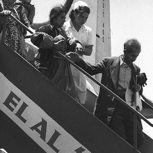 Jewish refugees being assisted from evacuation plane